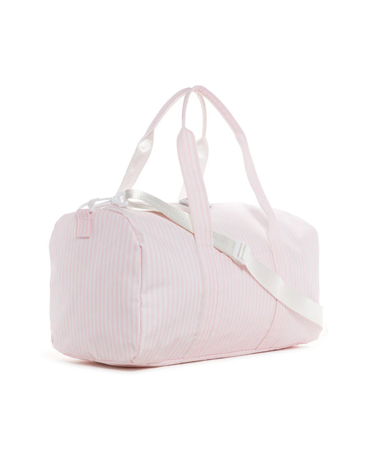 Side view of TRVL Weekender Duffel Pink Stripe showing size and shape