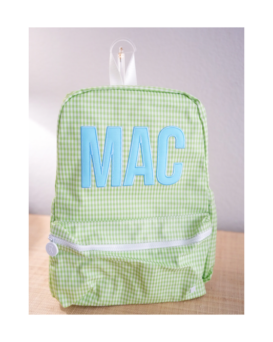 TRVL Backpacker kids backpack in Gingham Leaf, green gingham check with monogram embroidery