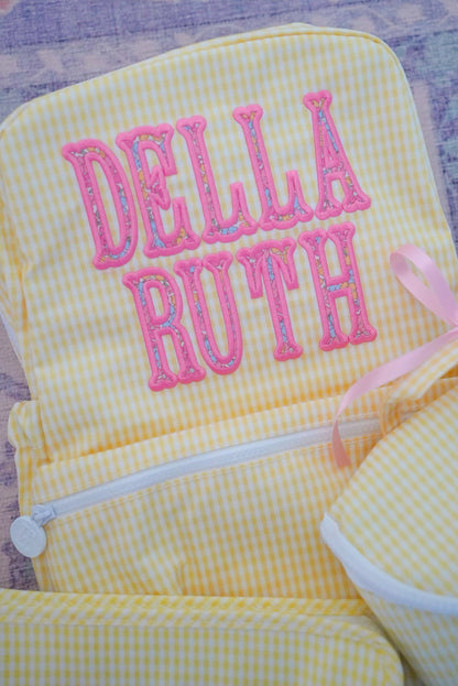 TRVL Backpacker kids backpack in Gingham Buttercup, sunny yellow gingham check with white zipper